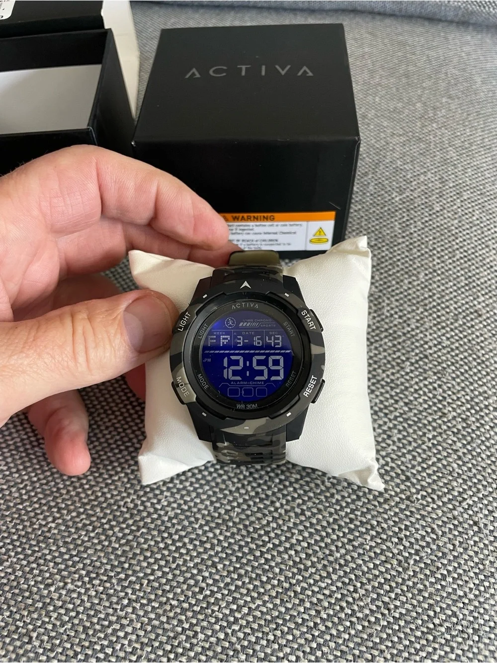 Activa X Terrain digital watch, featuring camouflage pattern and 45mm case.